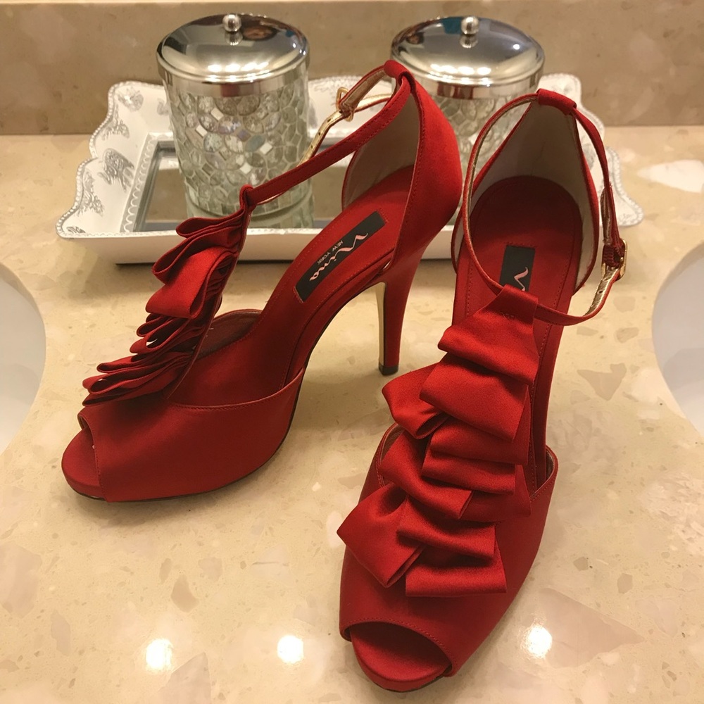 Red satin formal heels.